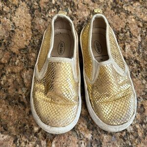Gold slip on shoes
